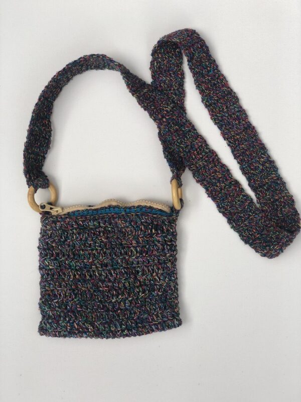 Hand crocheted small phone sling bag with a zip